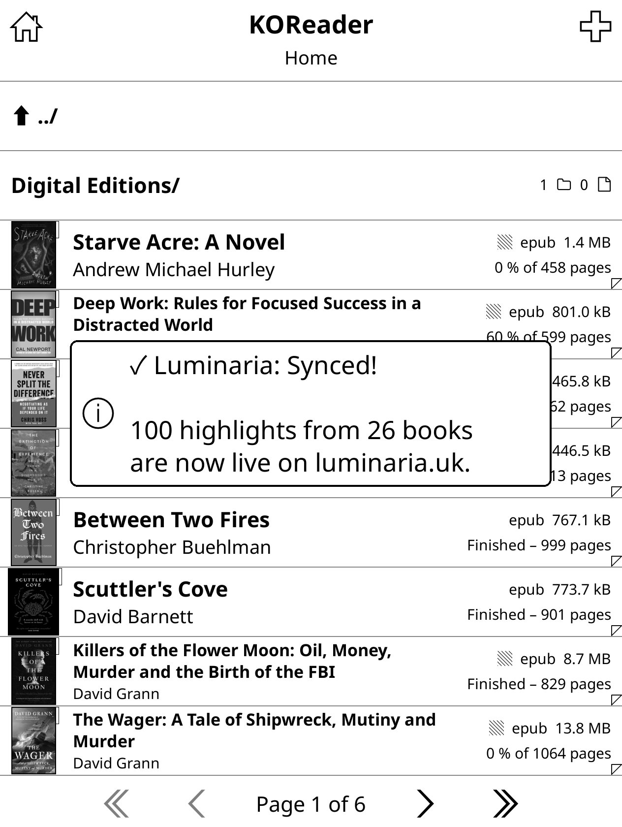 KOReader showing Luminaria sync confirmation — 100 highlights from 26 books synced
